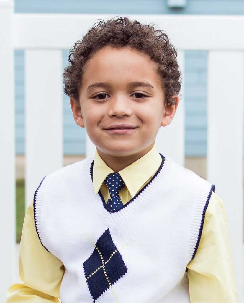 small boy looking straight forward