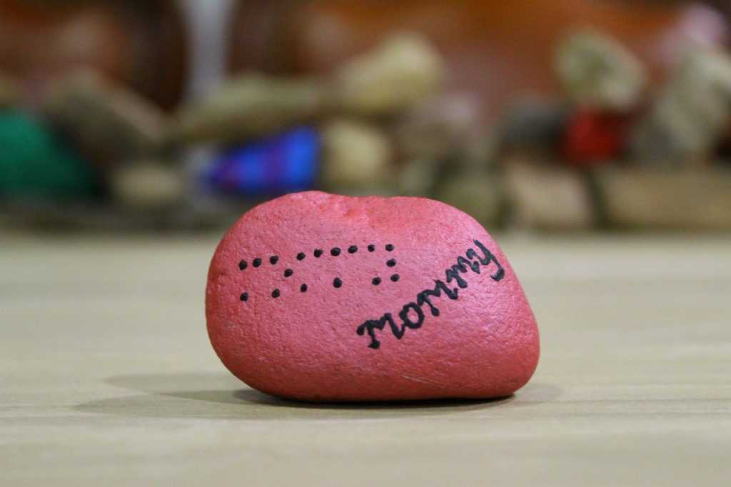 painted rock with Mommy on it